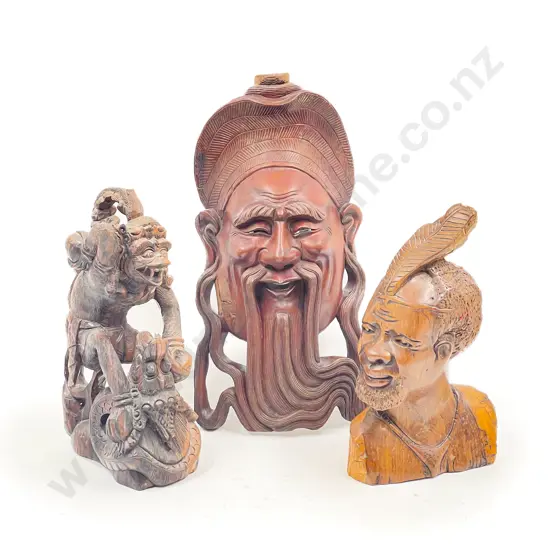 Carved Mask together with Two Others