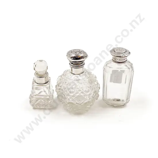 Two S/S Topped Vanity Bottles together with S/S Collared Example