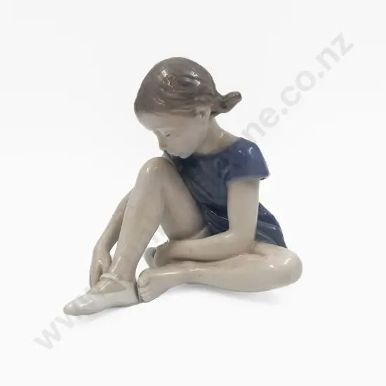 Royal Copenhagen Figure of Girl Putting on Ballet Flats
