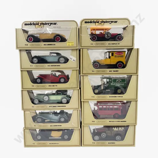 Eleven Yellow Boxed Models of Yesteryear