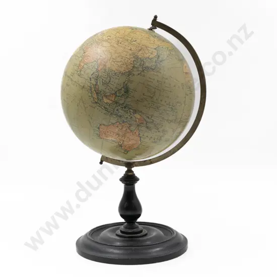 Philips 9 Inch Terrestrial Globe with arched gilt brass holding arm on ebonised stand