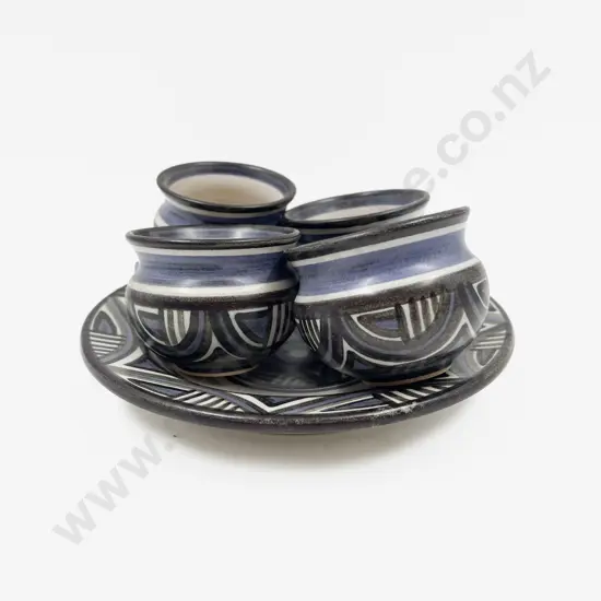 Four Anneke Borren Unomi together with Plate