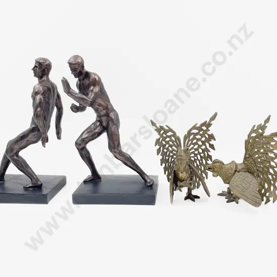 Pair Composition Male Figure Bookends and Pair Brass Fighting Cockerels
