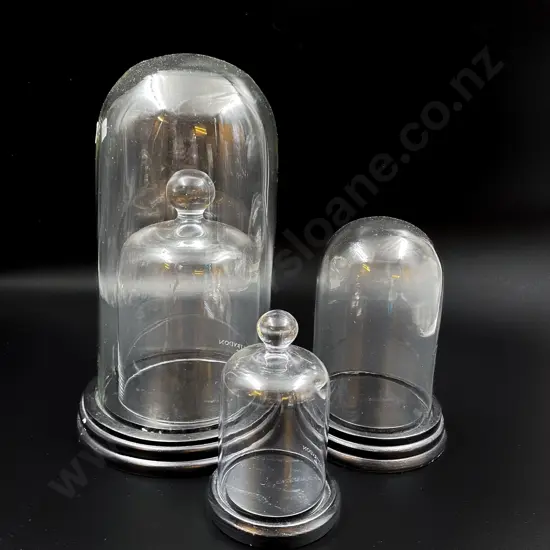 Four Assorted Modern Glass Domes of Sizes
