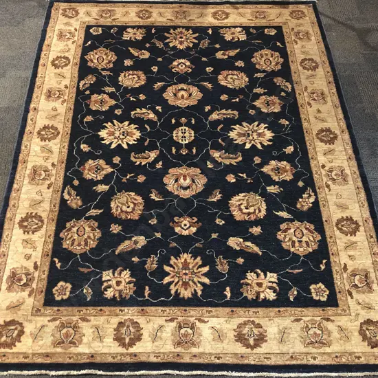 Large Woollen Floor Rug with All Over Floral Motif on Blue Ground