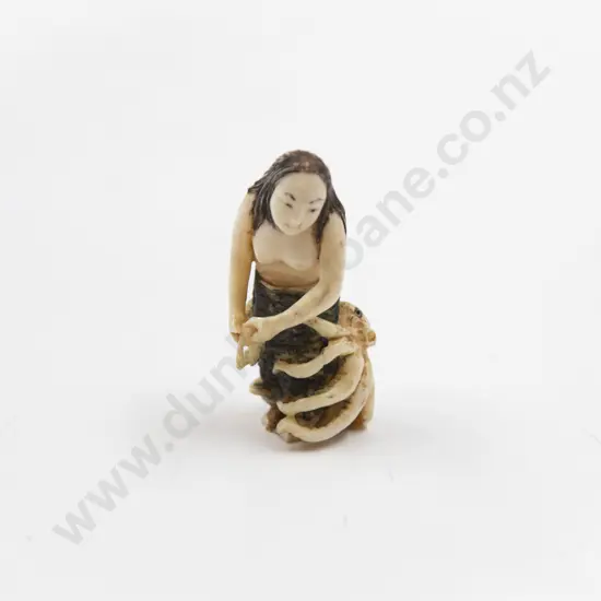 Signed Ivory Netsuke of a Fisherwoman Wrestling a Octopus