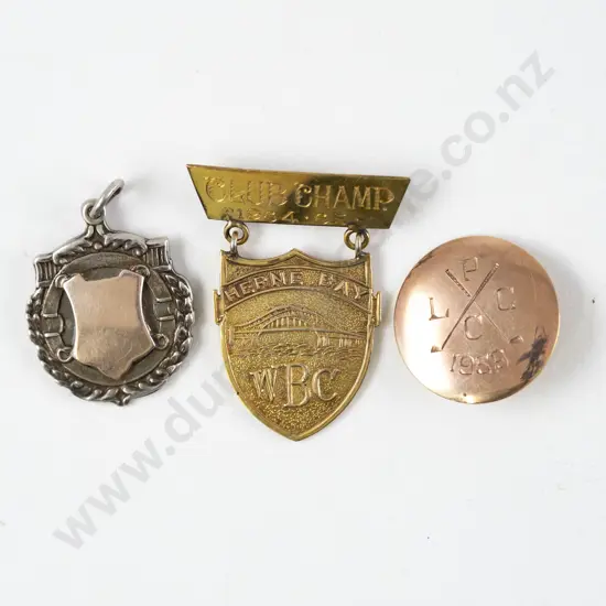 Two Engraved 9ct Medallion Brooches