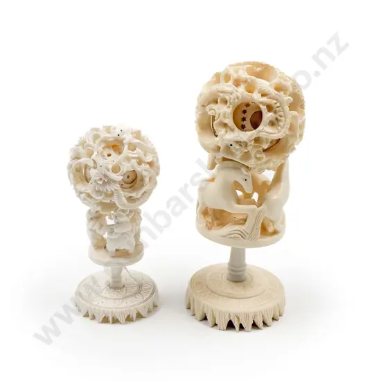 Ivory Puzzle Ball together with Larger Resin Puzzle Ball on Stands