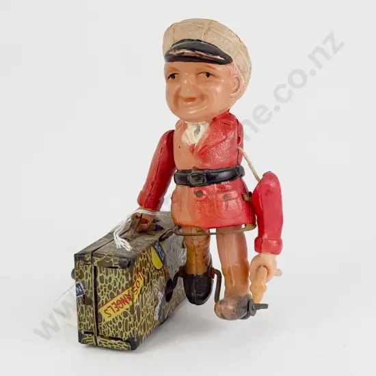 CK Mark Japan Tinplate and Celluloid Porter with Suitcase and Umbrella