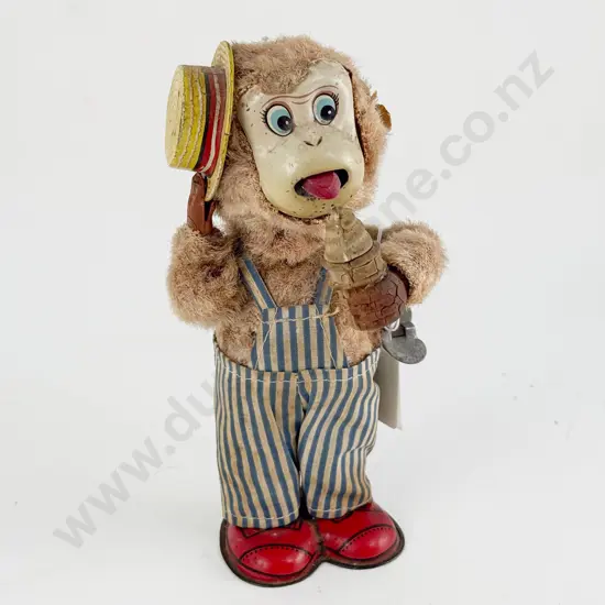 Made in Japan Flock and Tinplate Monkey with Ice Cream