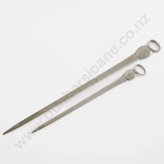 A Pair Of Geo III S/S Meat Skewers