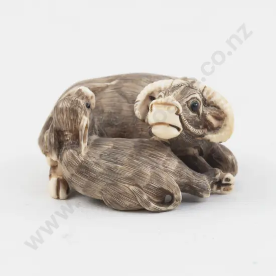 Signed Ivory Netsuke of Reclining Buffalo and Calf