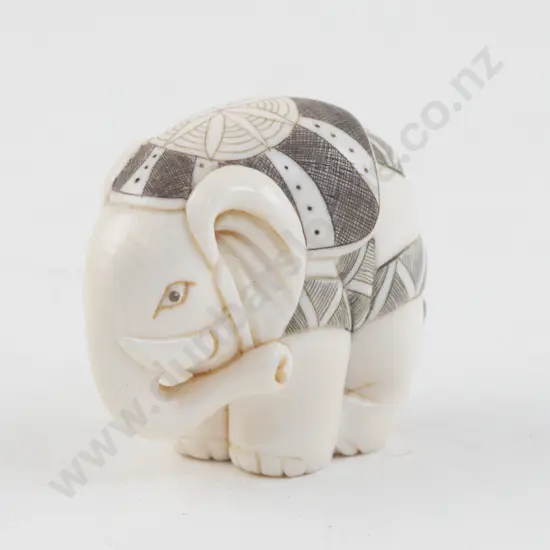Signed and Stained Ivory Netsuke of an Elephant