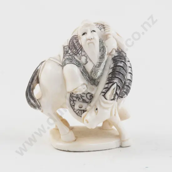 Signed Ivory Netsuke of an Immortal Riding a Horse