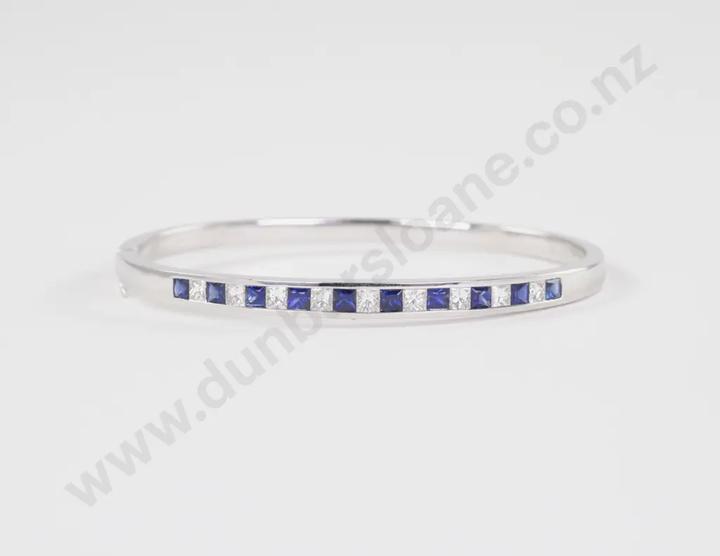 18ct White Gold 19Stone Sapphire and Diamond Hinged Snap Bangle Image 1++