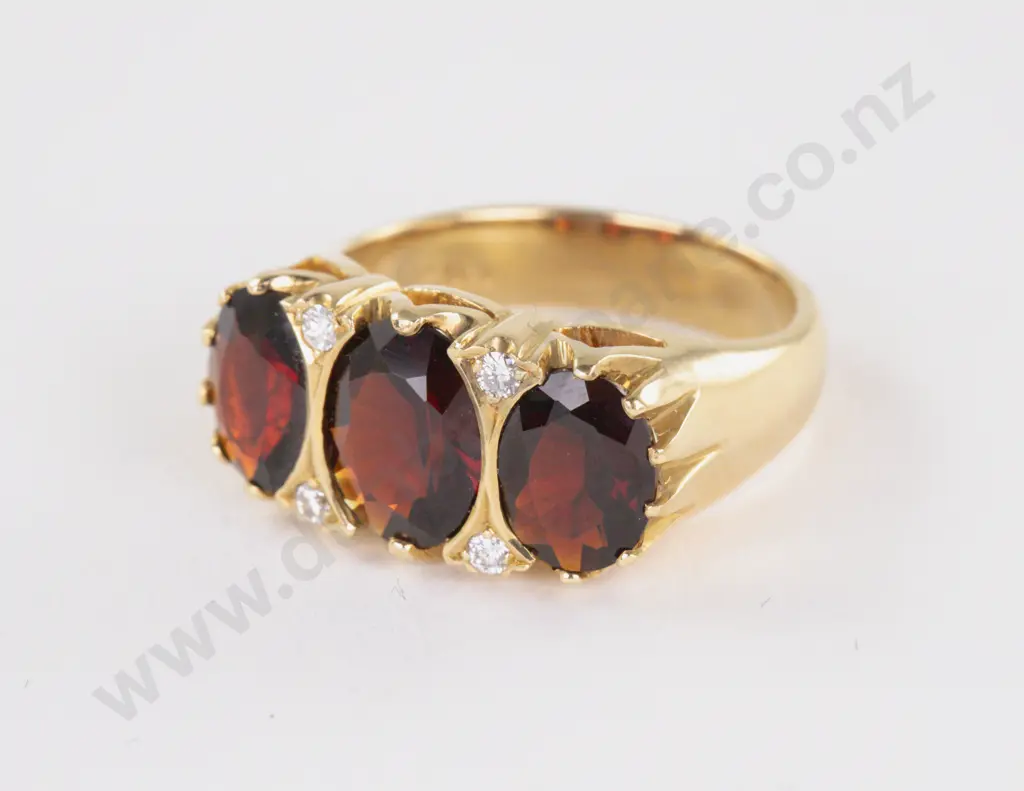 18ct Seven Stone Garnet and Diamond Ring Image 1++