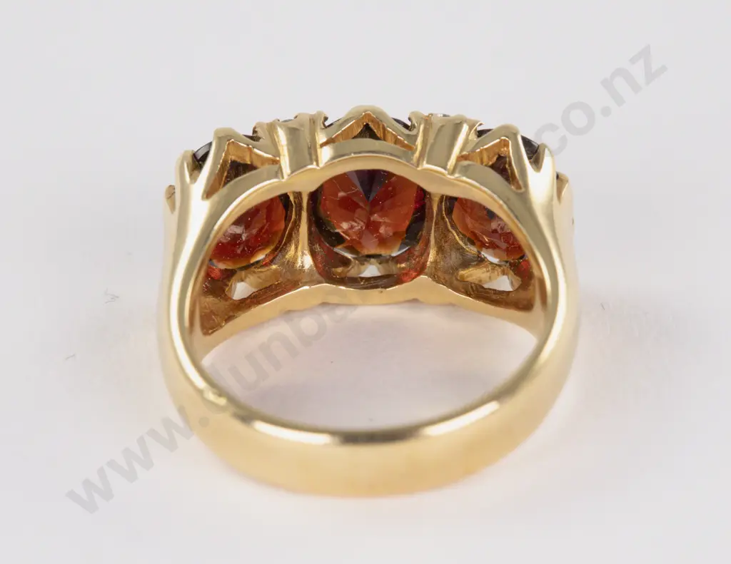 18ct Seven Stone Garnet and Diamond Ring Image 1++