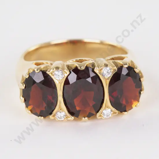 18ct Seven Stone Garnet and Diamond Ring