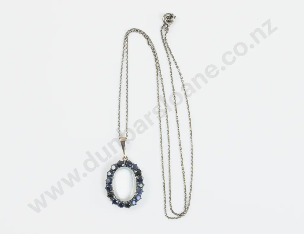 9ct Moonstone and Sapphire Cluster Pendant Image 1++