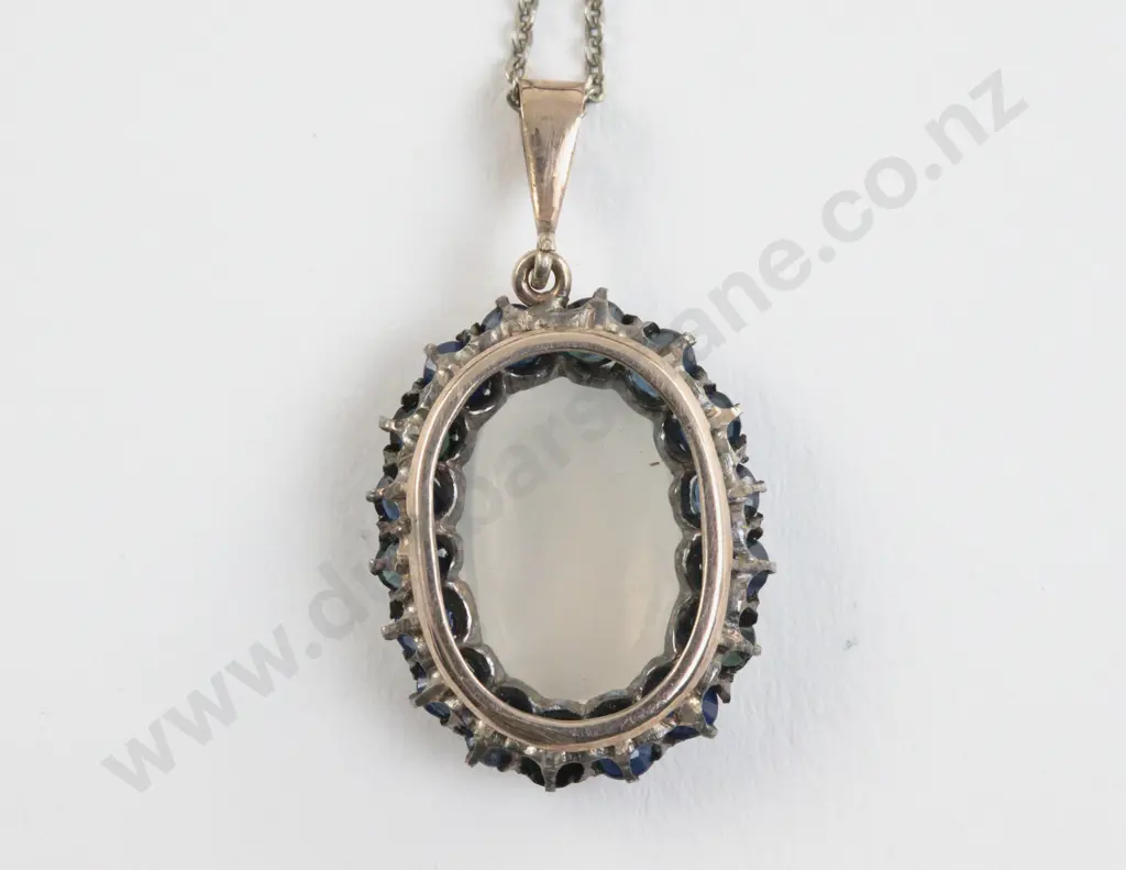 9ct Moonstone and Sapphire Cluster Pendant Image 1++