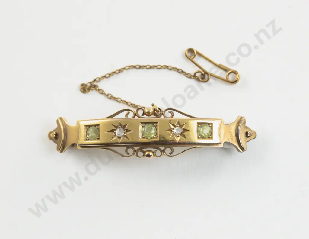 Victorian 9ct Five Stone Peridot and Diamond Curved Bar Brooch Image 1++