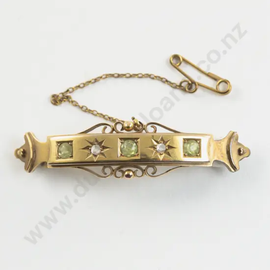 Victorian 9ct Five Stone Peridot and Diamond Curved Bar Brooch