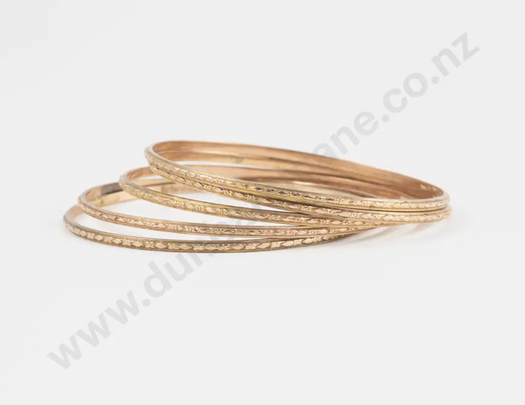 Five 9ct Engraved Bangles Image 1++