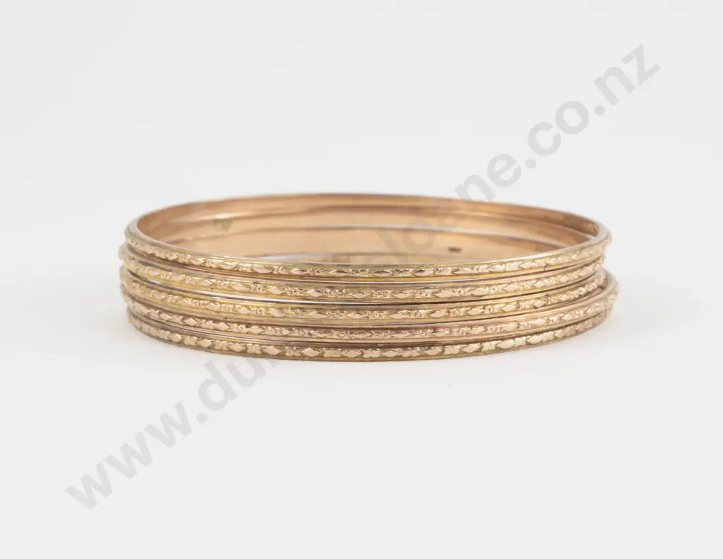 Five 9ct Engraved Bangles Image 1++