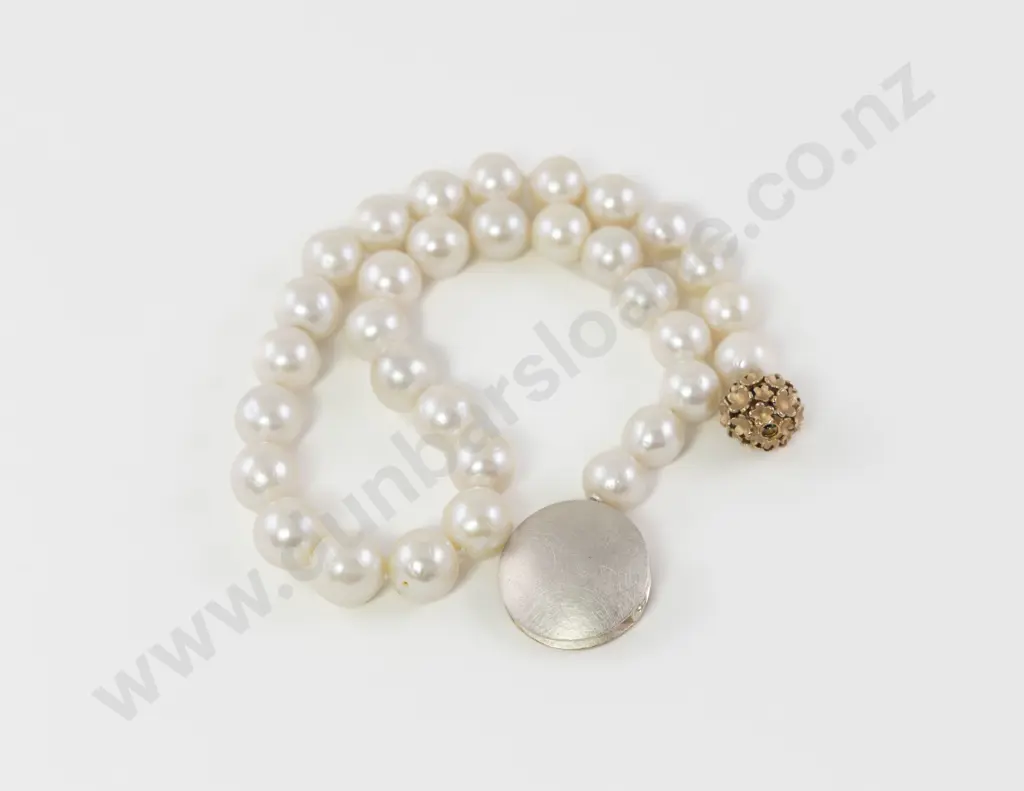 Single Strand Slightly Graduated Fresh Water Pearl Necklace Image 1++