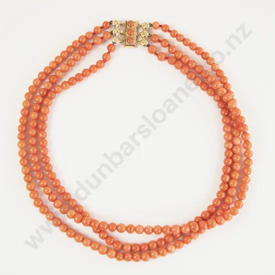 Triple Strand Slightly Graduated Coral Bead Necklace