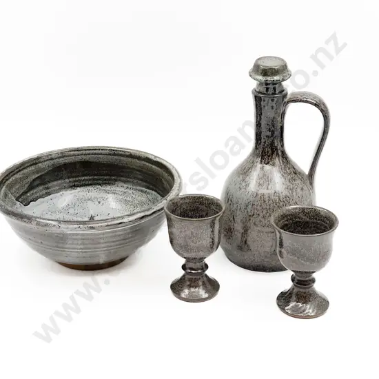 Pottery Flagon and Two Goblets Together with Fruit Bowl