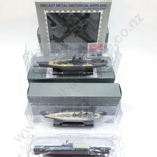 Four Boxed Battleship Models and Historical Airplane