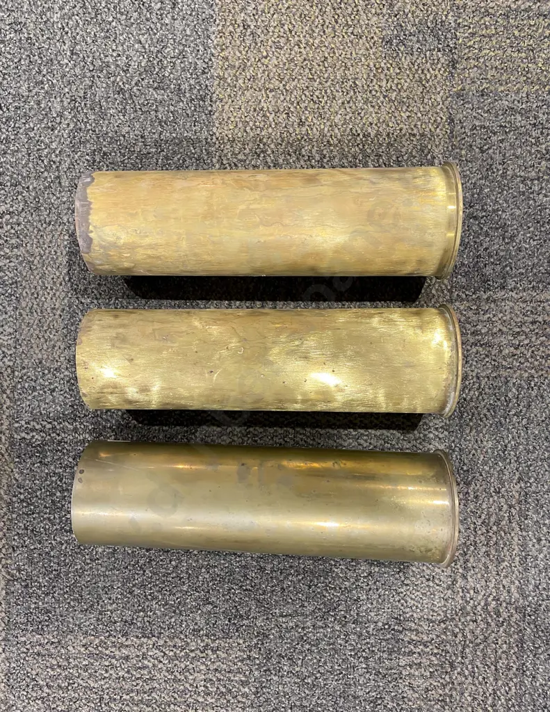 Three Brass Shell Casings Image 1++