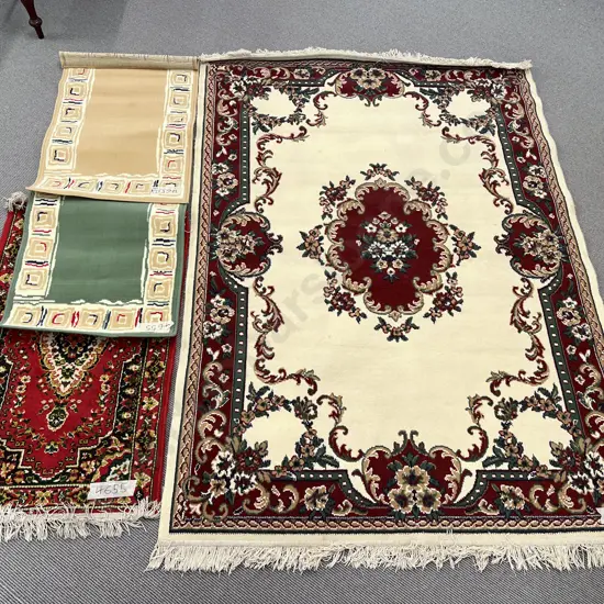 Four Assorted Machine Made Floor Rugs