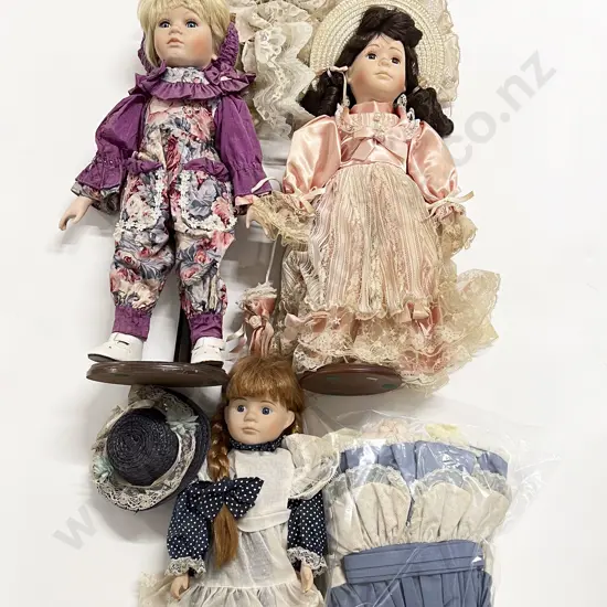 Three New Bisque Dolls with extra clothes and hat