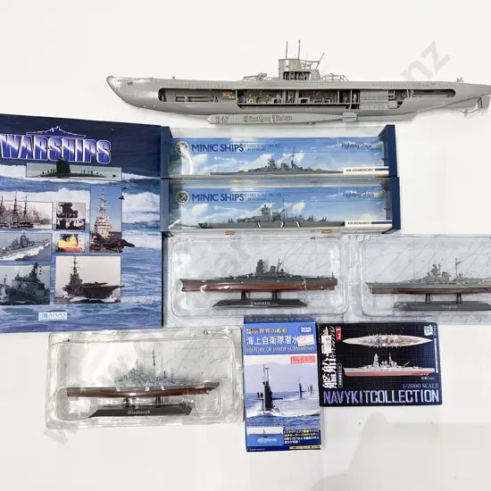 Boxed and Unboxed Eight Battle Ship Models and Reference Folder