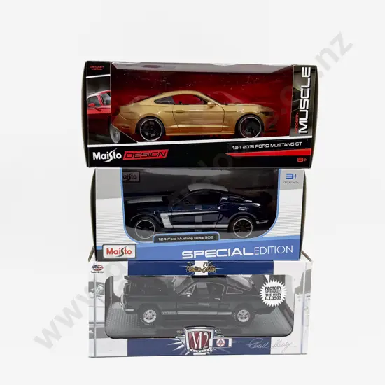 Three Boxed 1/24 Scale Vehicle Models