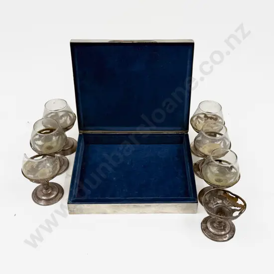 S/S Bound Cig. Box together with Seven Mexican Silver Overlay Liqueur Glasses