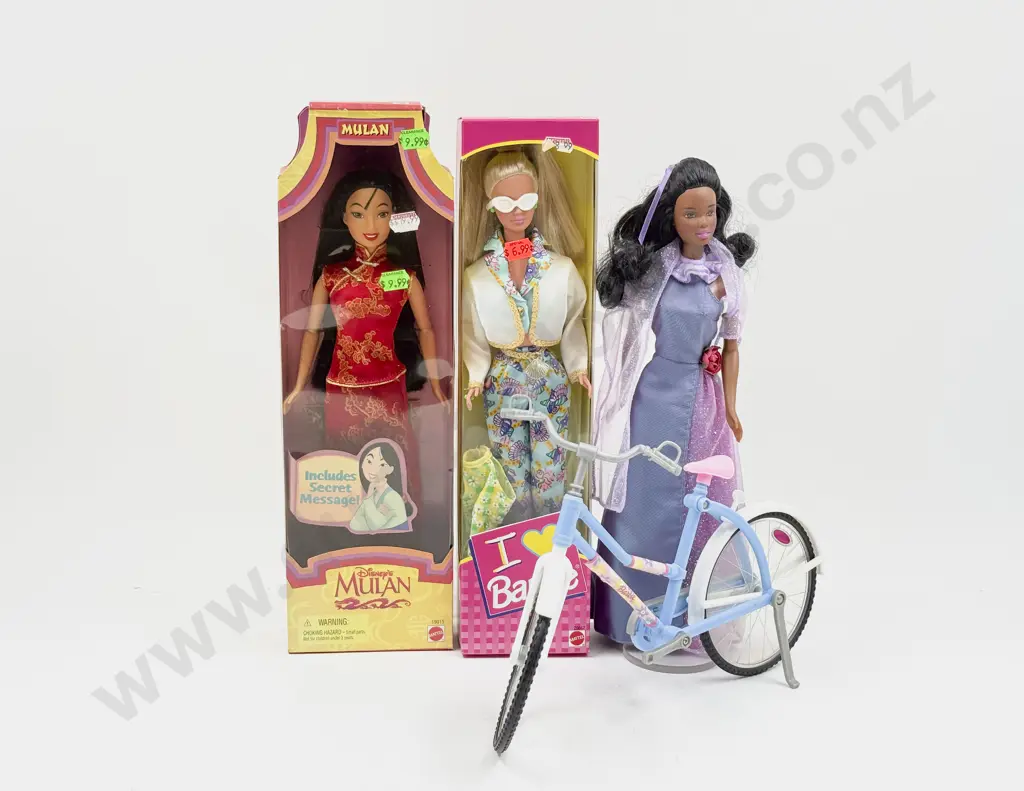 Two Barbie Dolls with Boxed Disney Mulan Doll and Barbie Bicycle Image 1++