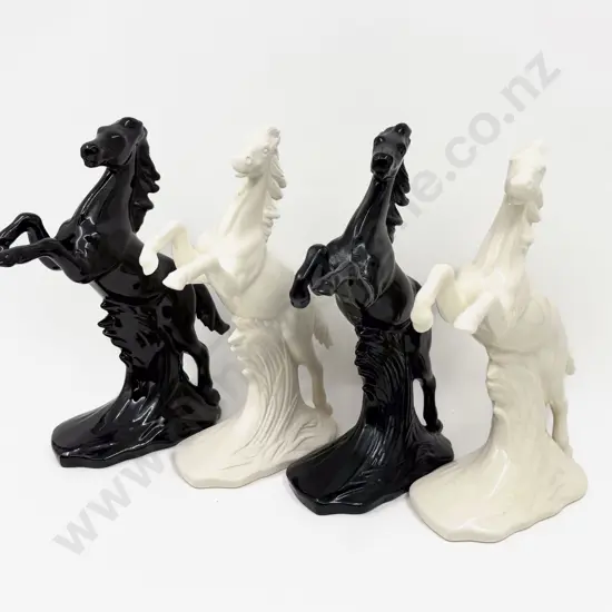 Four Horse Figurines
