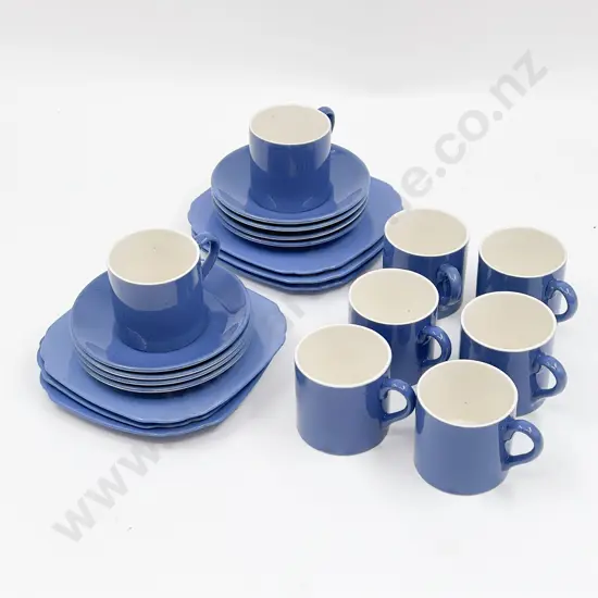 Eight Moorcroft Coffee Cans and Saucers with Six Side Plates