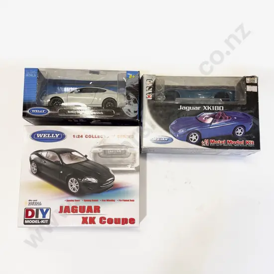 Three boxed Model Cars