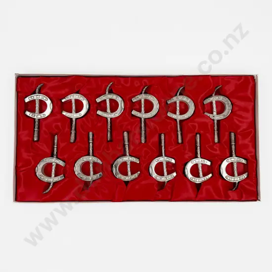 Cased Set of Twelve Horseshoe-Shaped Chopstick Rests