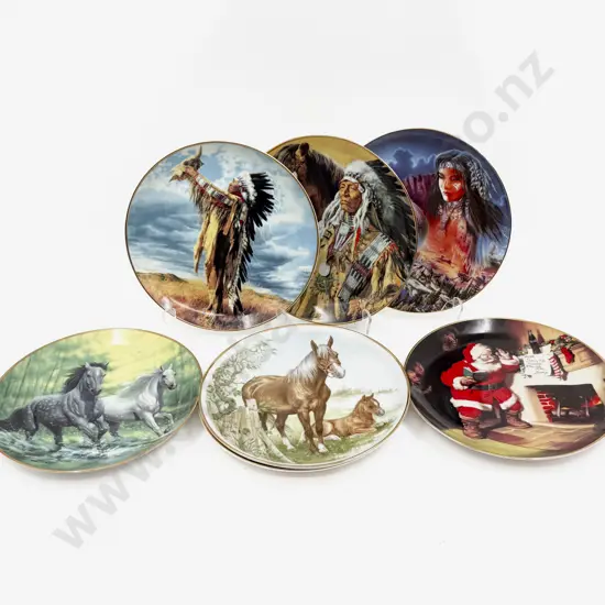 Seven RD Franklin Mint Decorative Plates