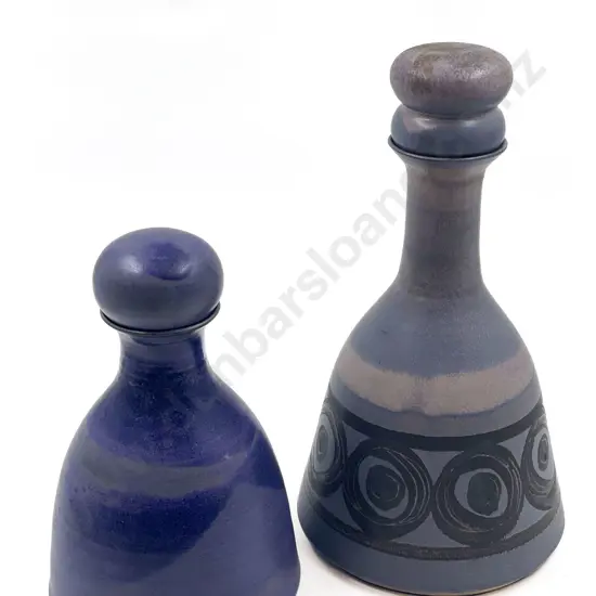 Two Sally Vinson Pottery Stoppered Decanters