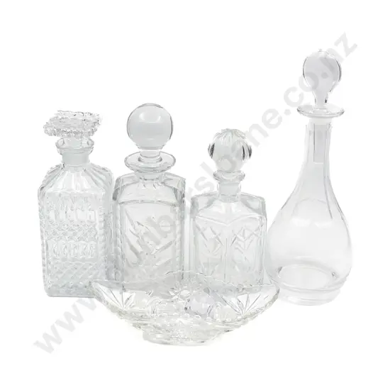 Glass Whiskey Decanter With Three Other Decanters and Assorted Stoppers