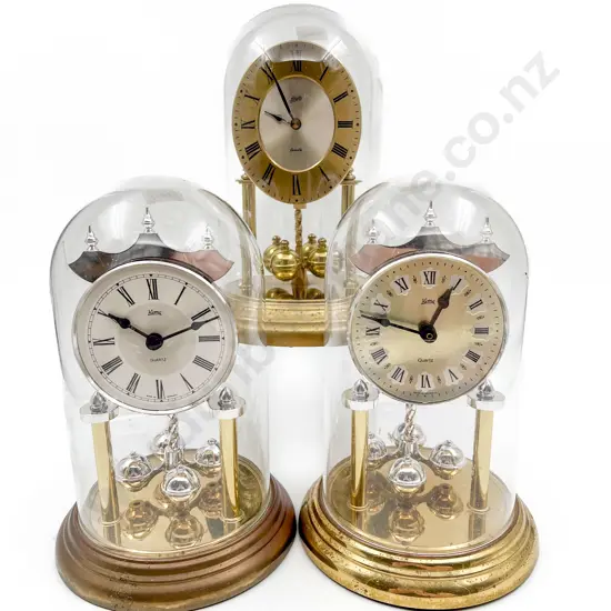 Three Dome Cased Clocks