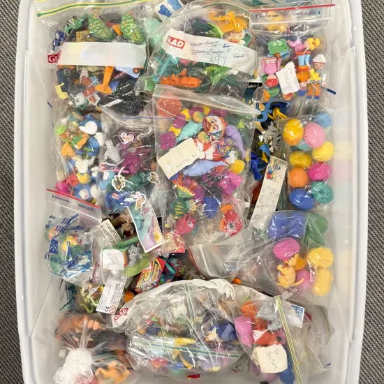 Plastic Storage Bin of Completed Kinder Surprise Toys