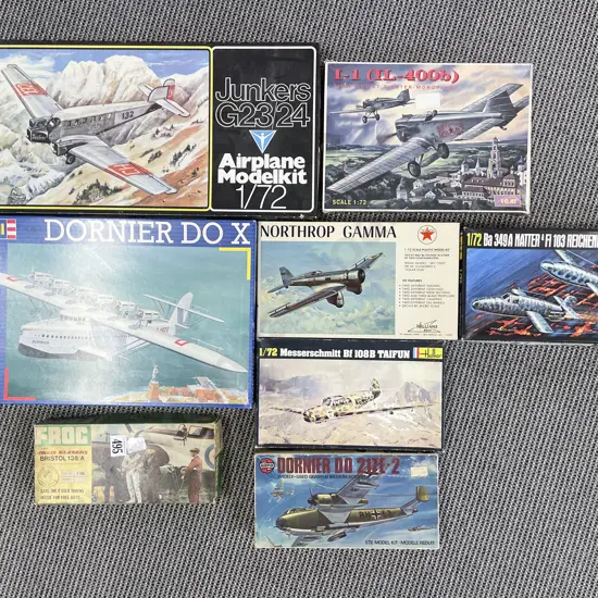 Eight Vintage Model Plane Kits (opened)