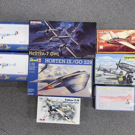 Eight Vintage Model Plane Kits (opened)